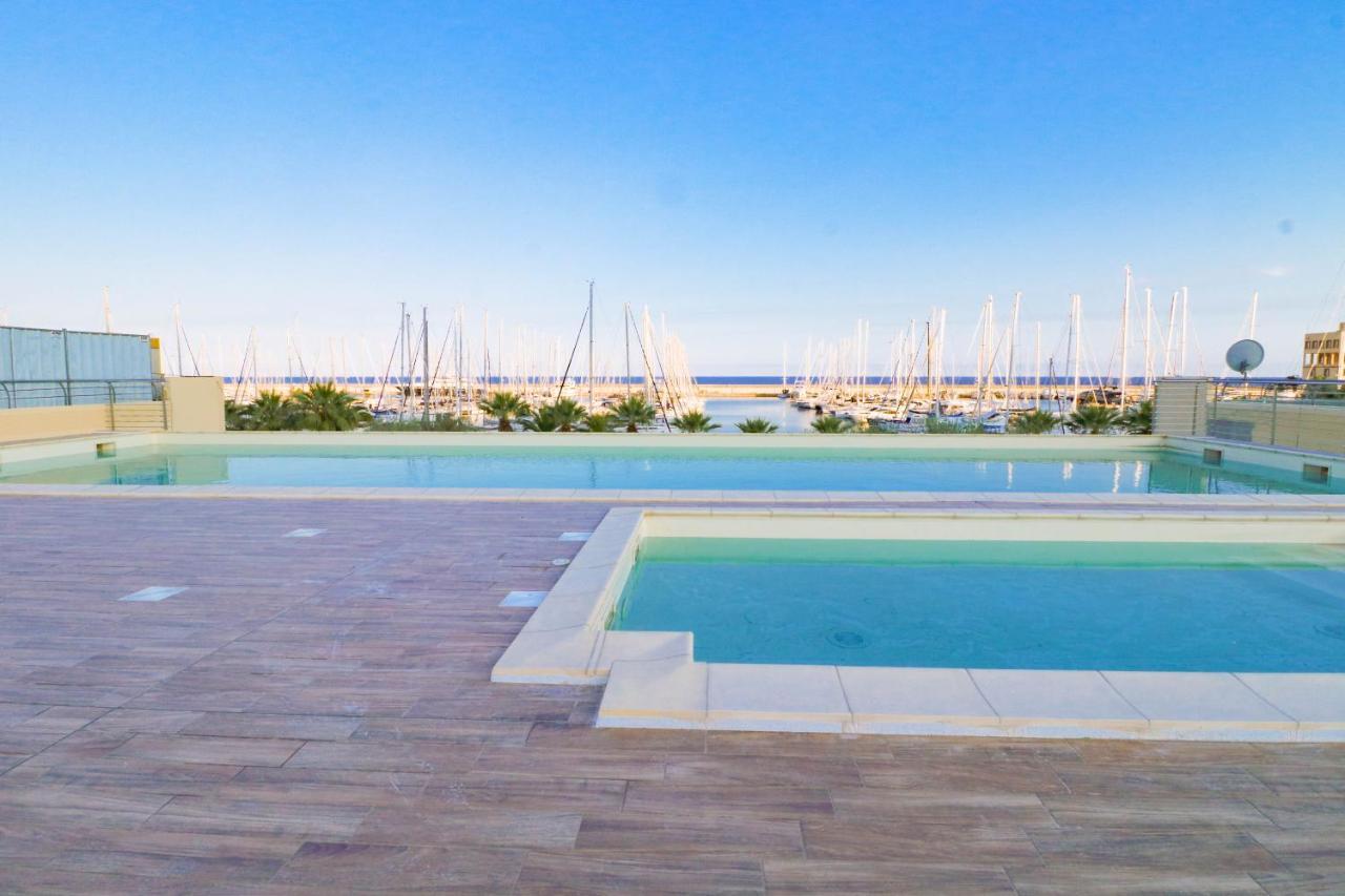 H11 Luxury 9A - Porto - Piscina - Jacuzzi Lägenhet Santo Stefano al Mare Exteriör bild